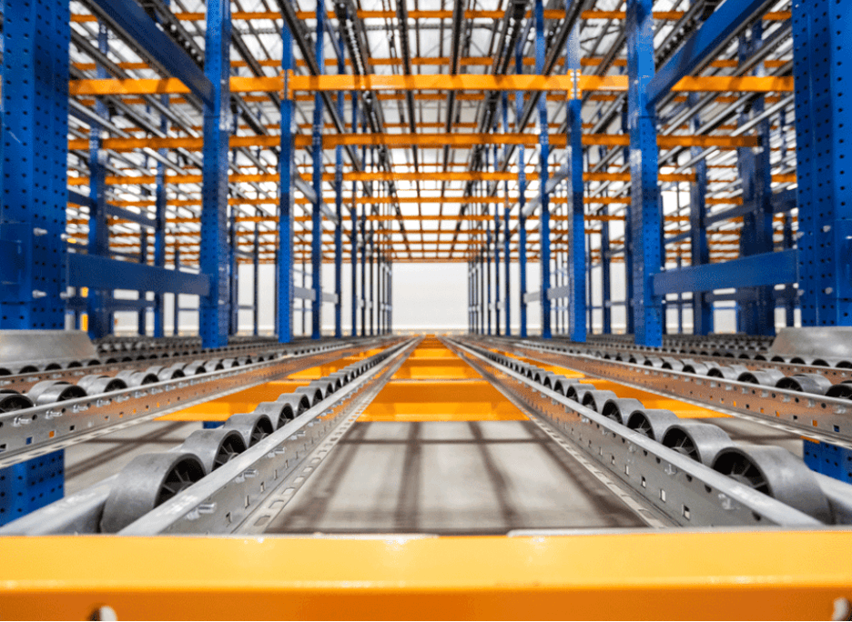 Push-back pallet racking installation in a Lancaster, PA warehouse — high-density storage system with gravity-fed cart lanes